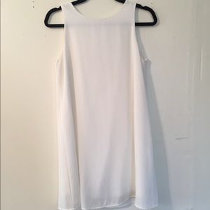 White shift dress with bow backing